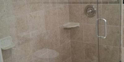 Heavy glass frameless shower door with notch panel